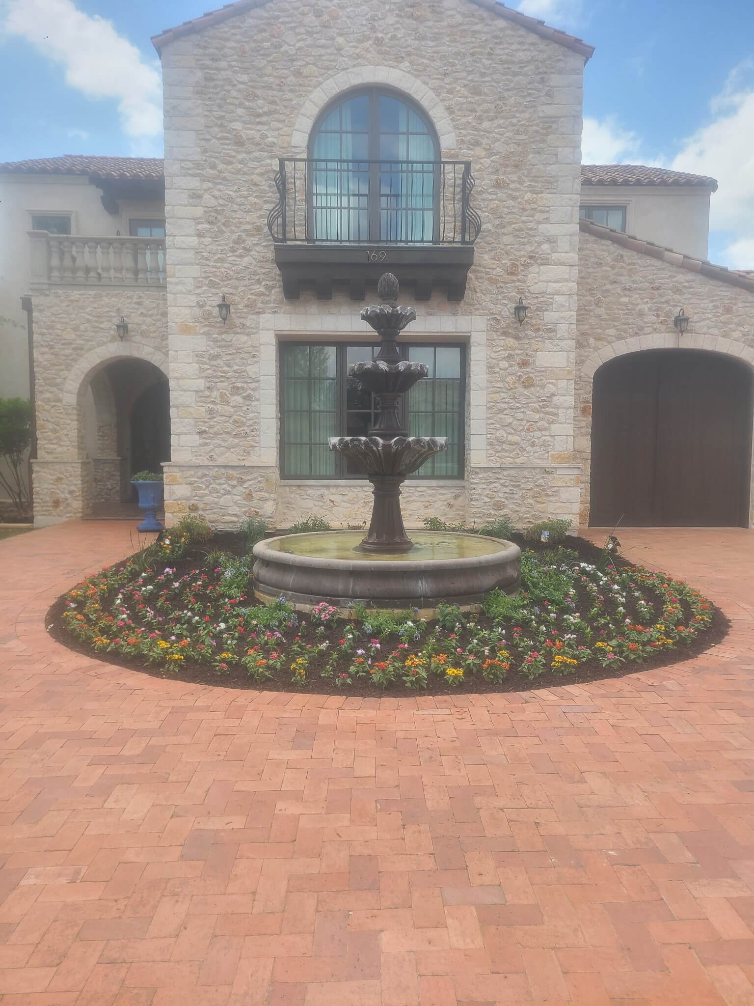 Planting beds around fountain feature
