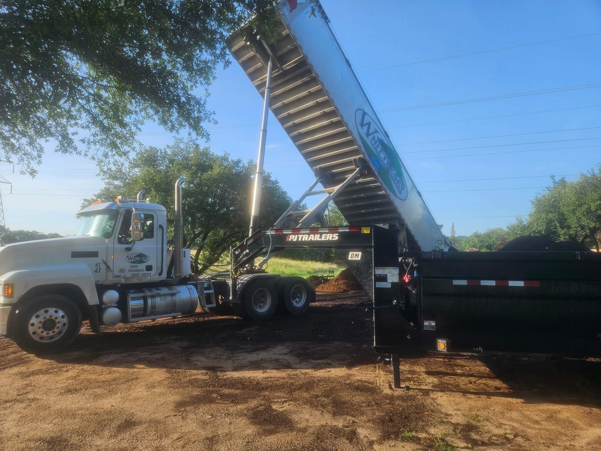 Dirt import and site grading for new landscape